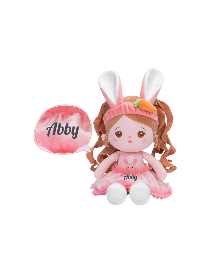Abby stuffed animal with bunny ears and pink dress